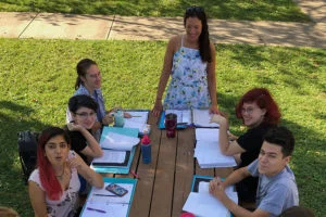 Student working with a teacher