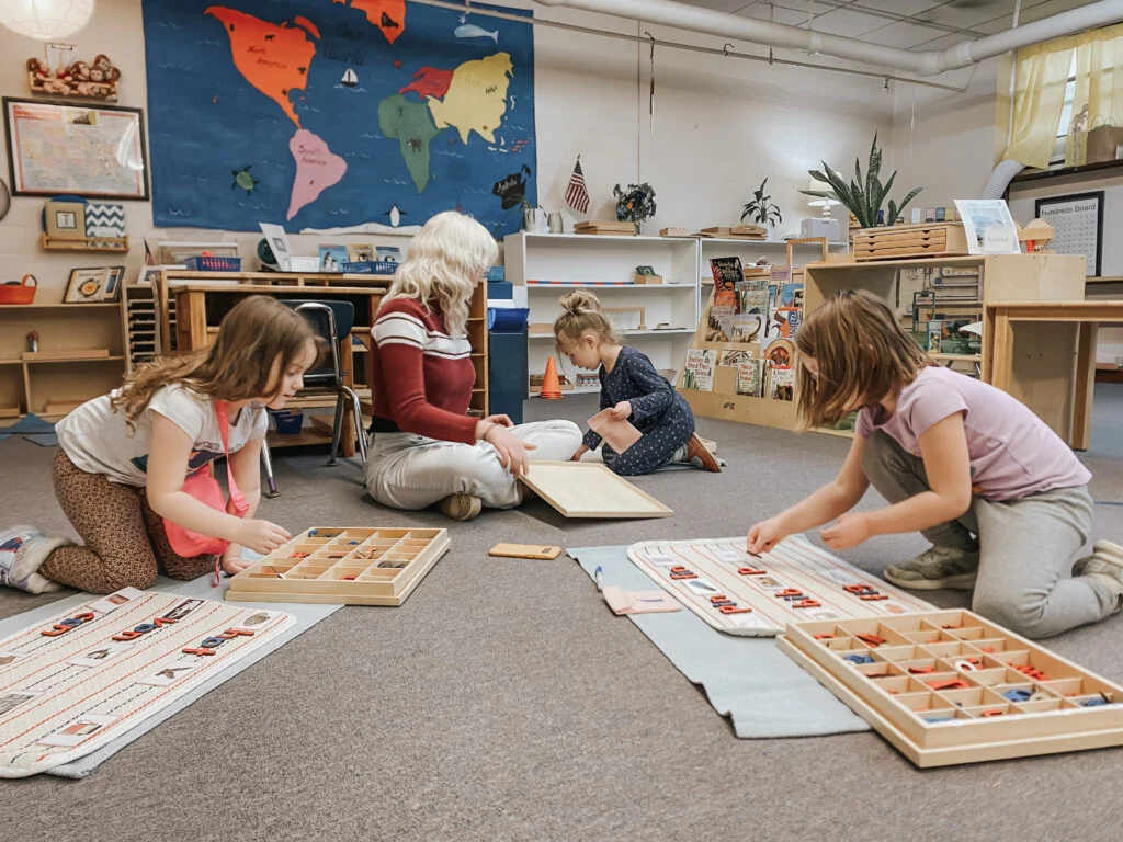 Preschoolers working together at a table